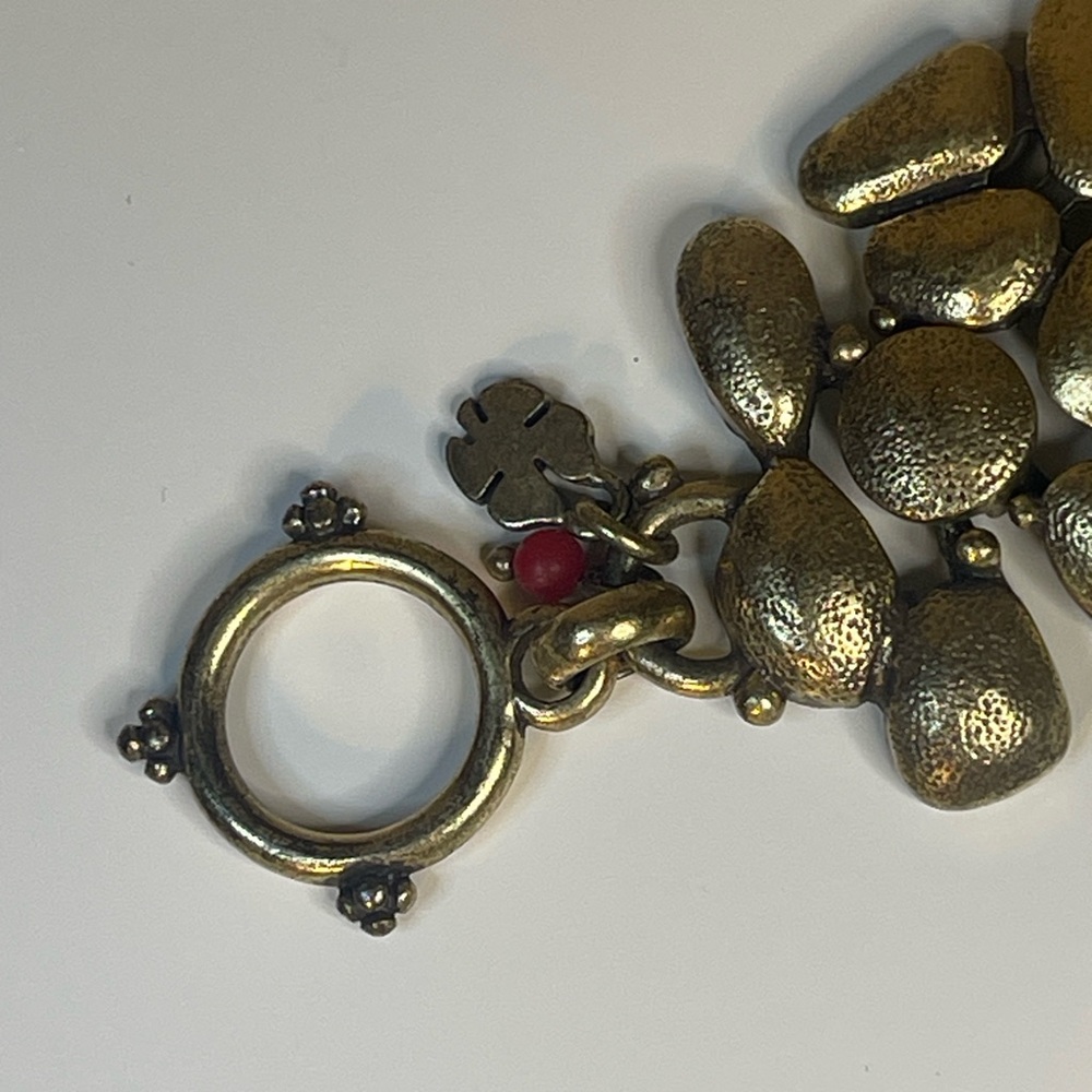 Lucky Brand gold-tone beaded bracelet with a signature four-leaf clover charm. - Picture 2 of 6
